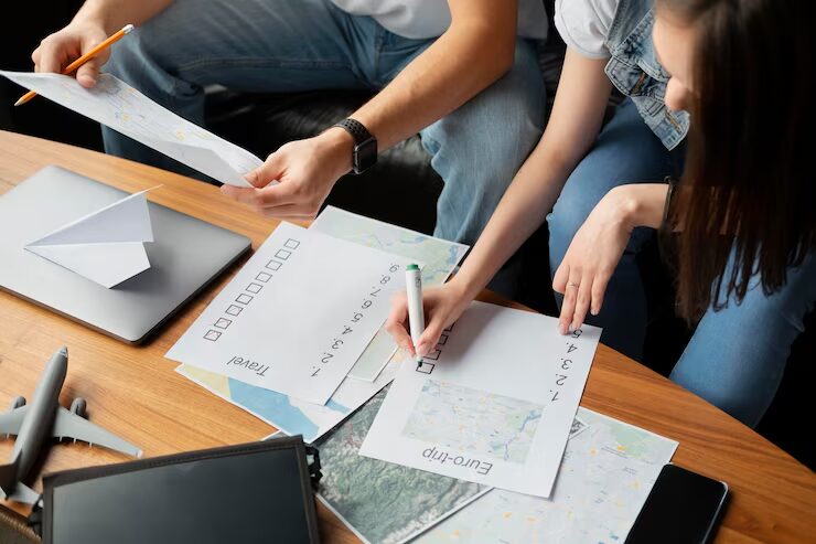 A couple doing research before travelling