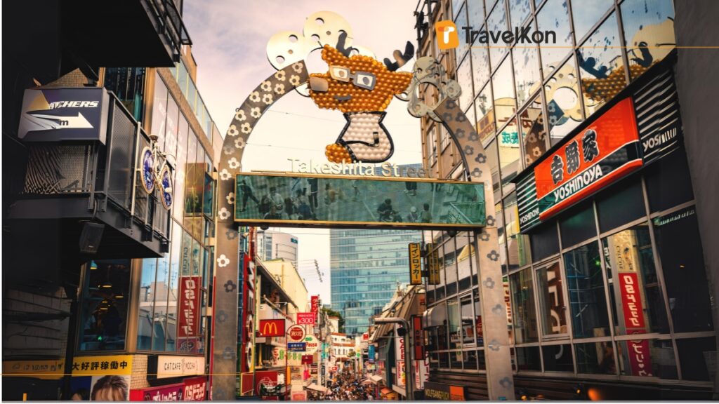 a sign over a takeshita street tokyo