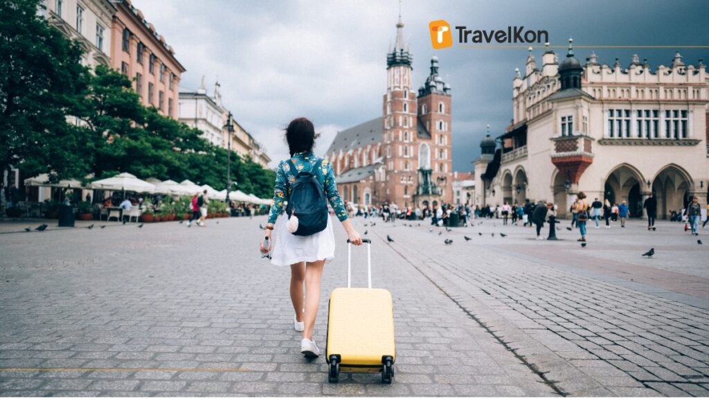 a woman walking with a suitcase as solo traveller